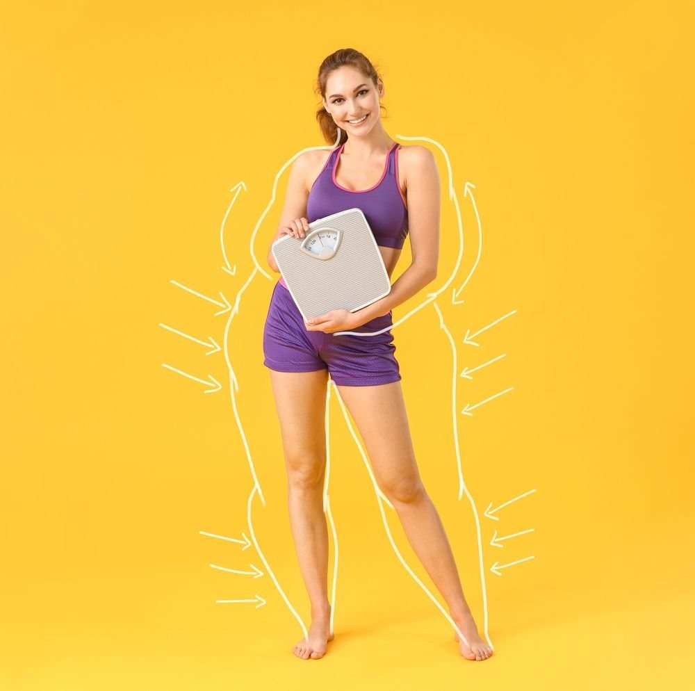 Woman holding bathroom scales with a slimmer body outline drawn behind her, illustrating the cost of weight loss treatment in Ireland