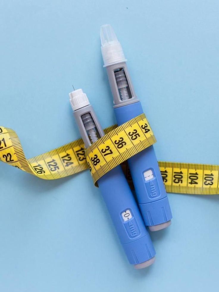 GLP-1 treatment in Ireland, explained Two GLP-1 injection pens beside a measuring tape, representing the monthly cost of weight loss treatment in Ireland